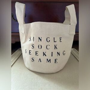 Small soft speckled off white canvas bucket for socks with text NWOT